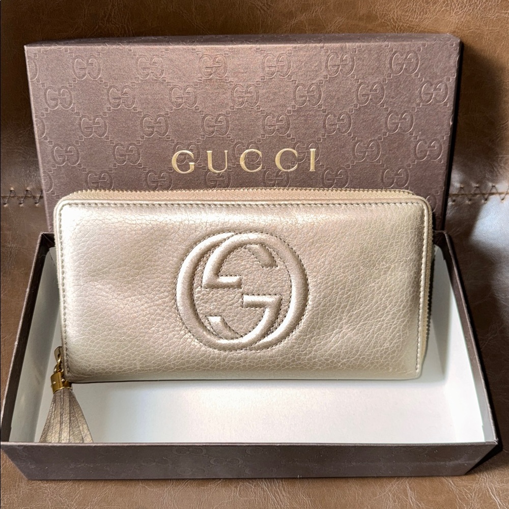 Gucci Metallic Gold Zip-Around Tassel Wallet